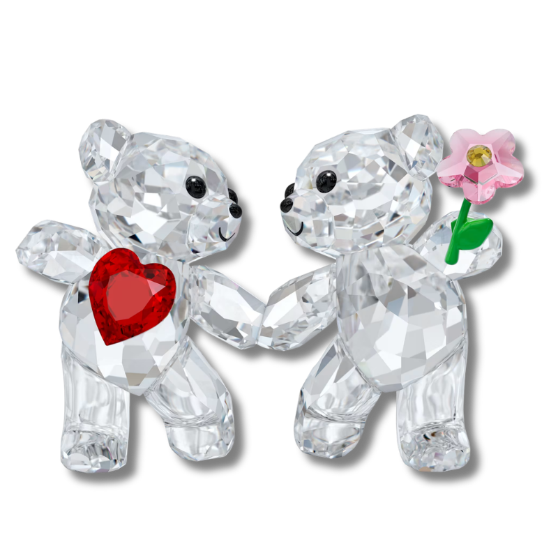 Two glass bears holding hands