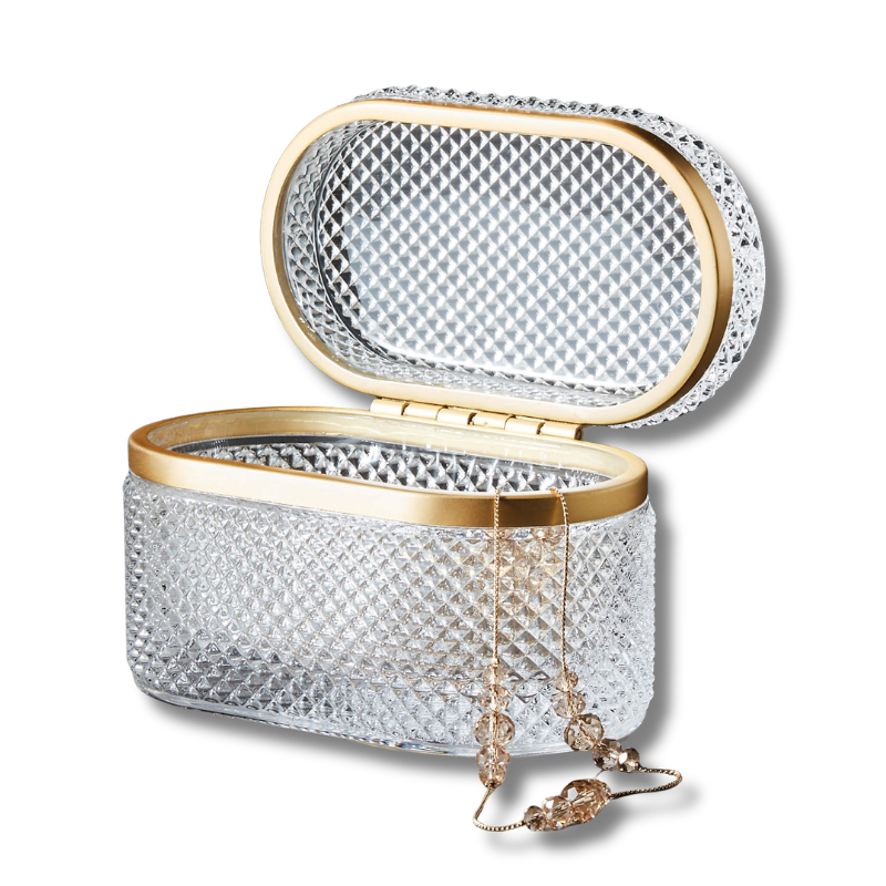 Glass jewelry box with gold accents