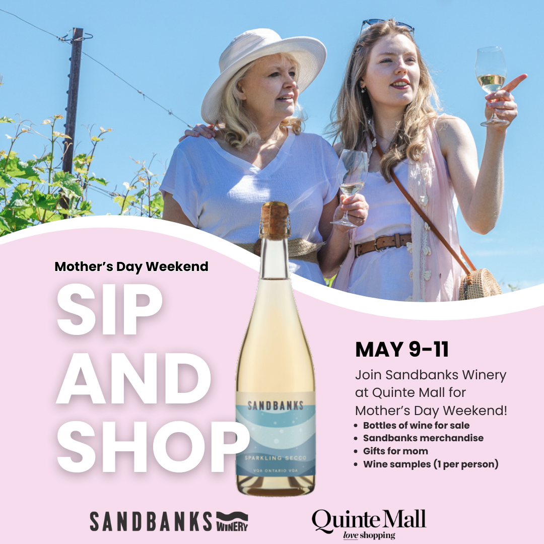 mother and daughter stand side by side in a vineyard, both have glasses of wine. Pink background and white text reads mother's day weekend sip and shop. 